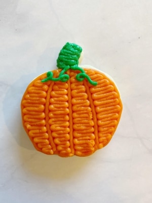 buttercream pumpkin decorated cookie