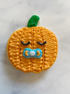 a little pumpkin is on the way cookie