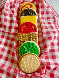 decorated hamburger sugar cookies with buttercream