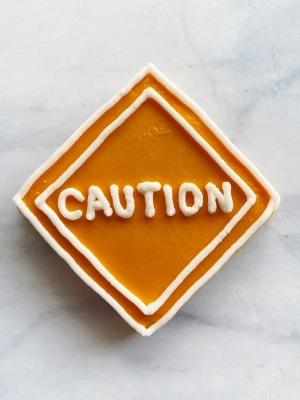 how to decorate construction sugar cookies with buttercream caution sign