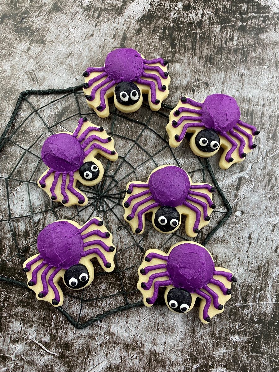 decorated spider cookies with buttercream frosting