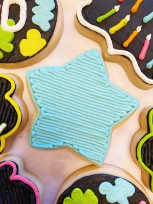 glow party cookies with buttercream icing star