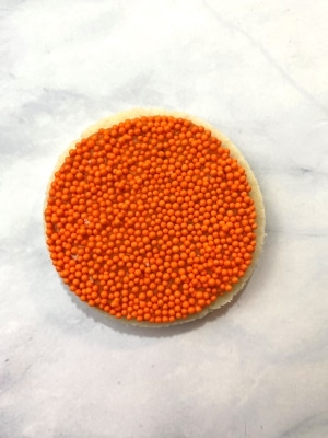 orange nonpareil on basketball cookie for basketball texture