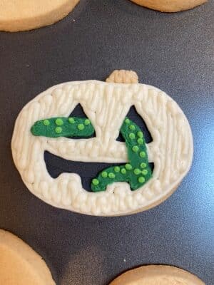 Halloween snake sugar cookies with buttercream green dots added