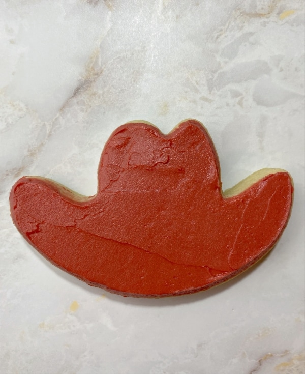 smoothed buttercream on cowboy hat cookie