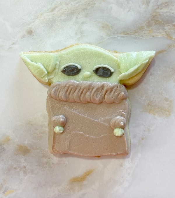 baby yoda cookies with piped eyelids