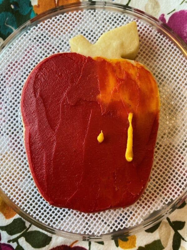 adding yellow to the red apple