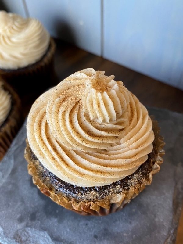 chai buttercream frosting on chocolate cupcake