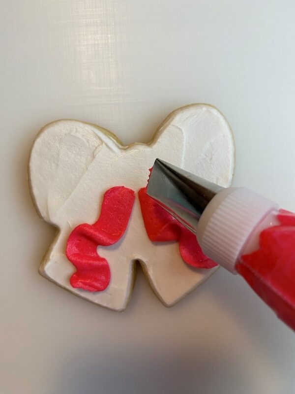 velvet bow sugar cookies with buttercream frosting