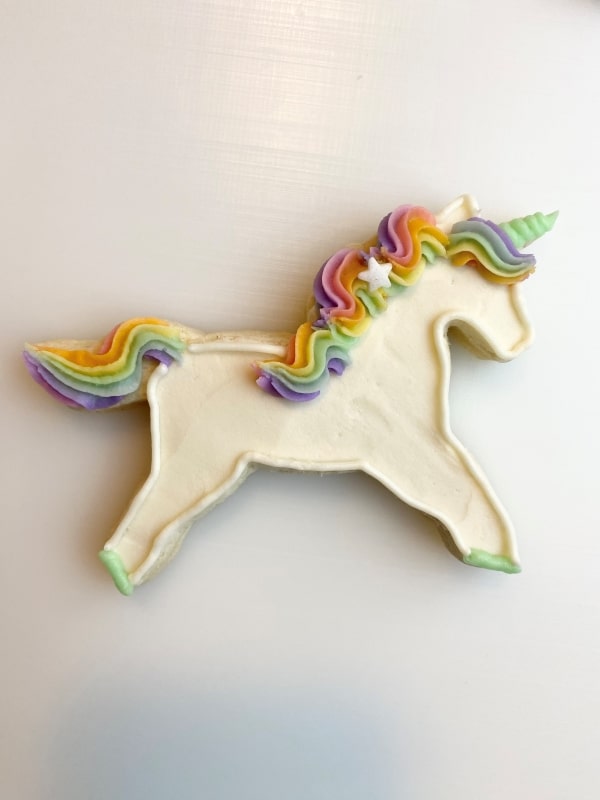 decorated unicorn cookies with buttercream