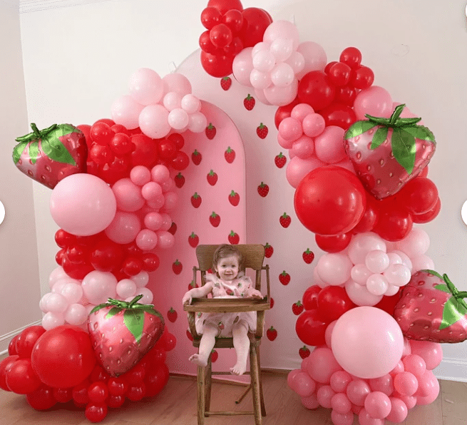 berry first birthday party balloon arch