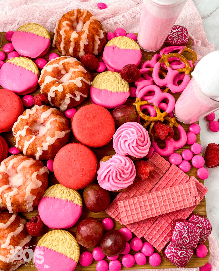 barbie pink charcuterie board for a barbie birthday party food idea