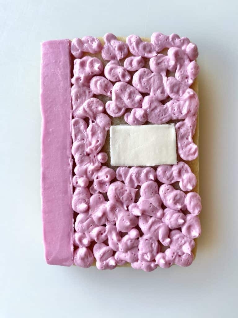 composition notebook cookie with buttercream
