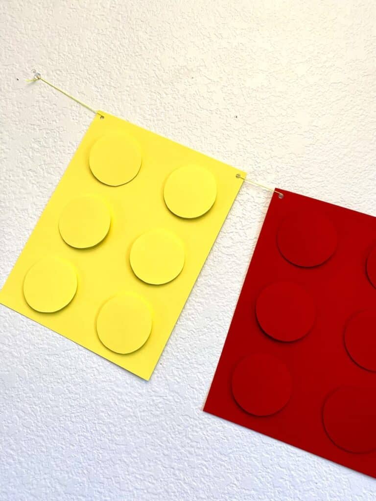 stringing up the DIY LEGO Banner